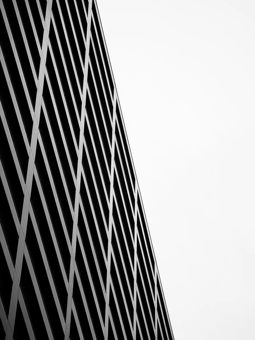 a black and white photo of a tall building