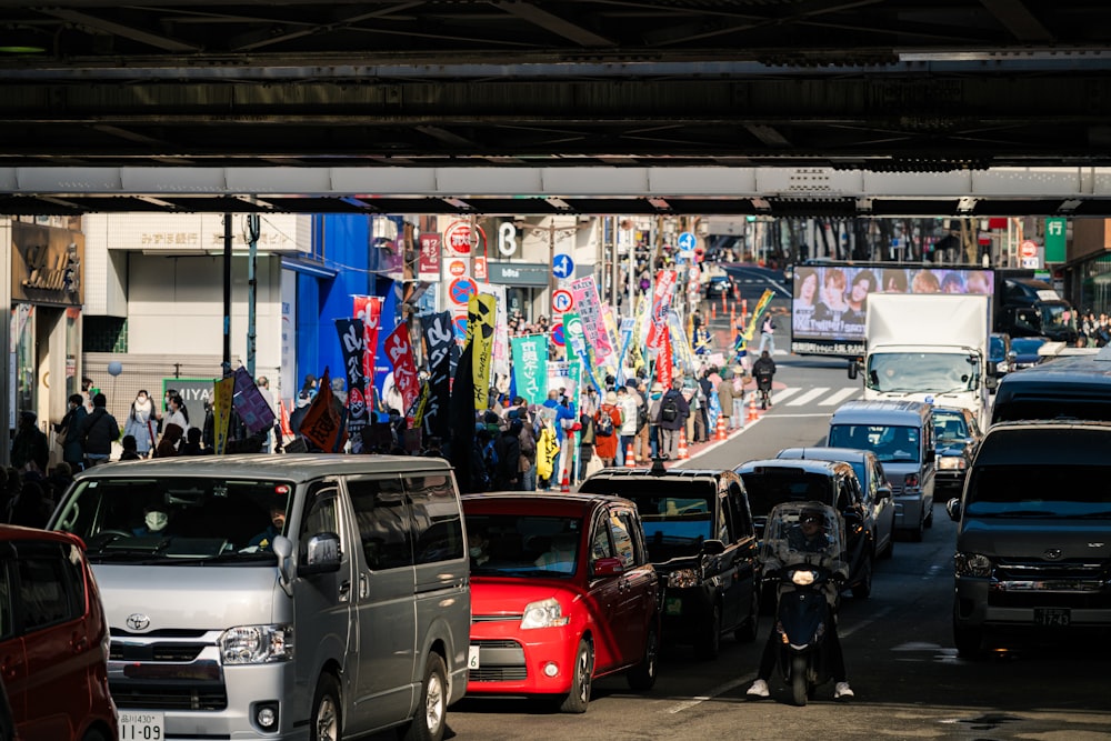 a bunch of cars that are sitting in the street