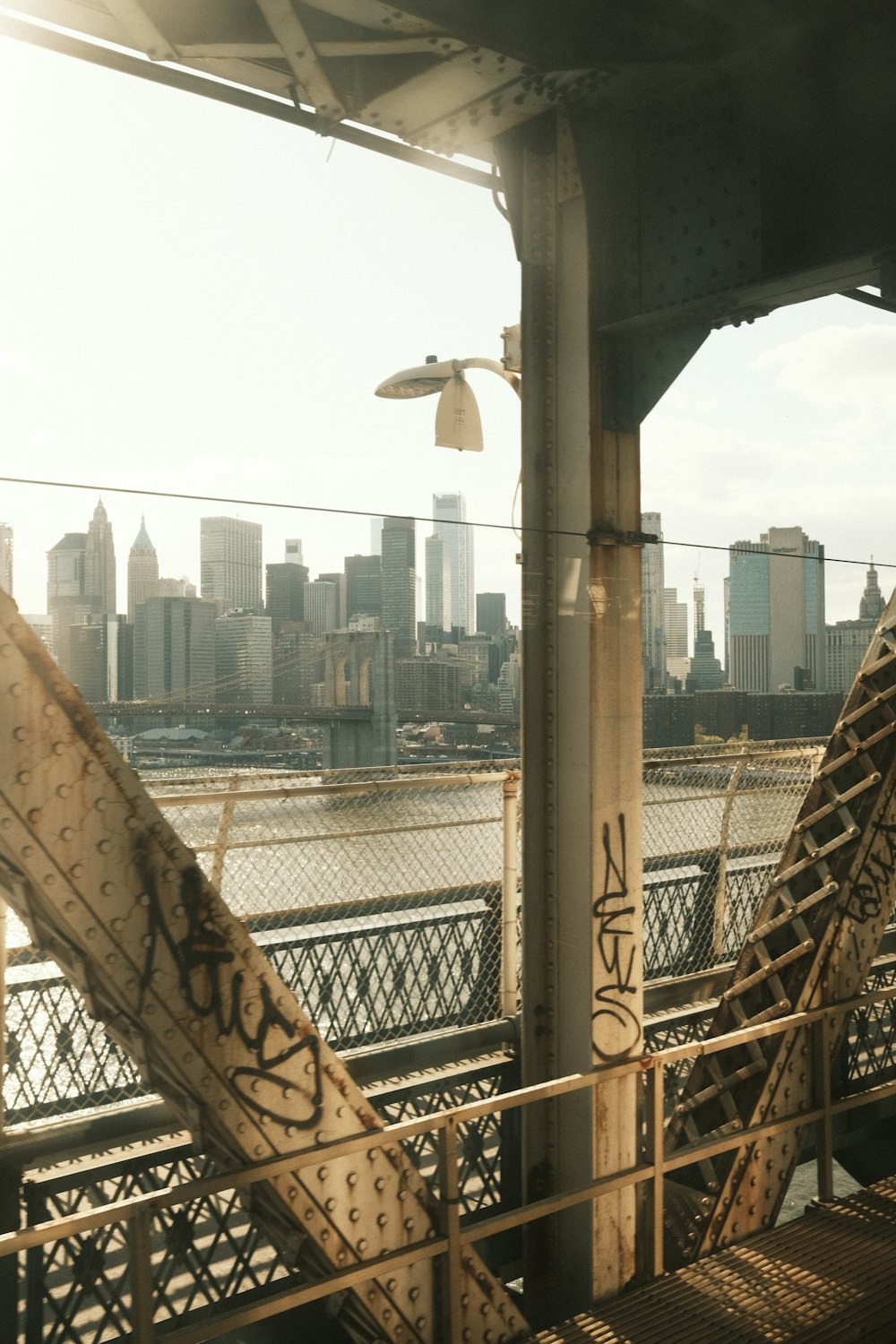 a view of a bridge with a city in the background