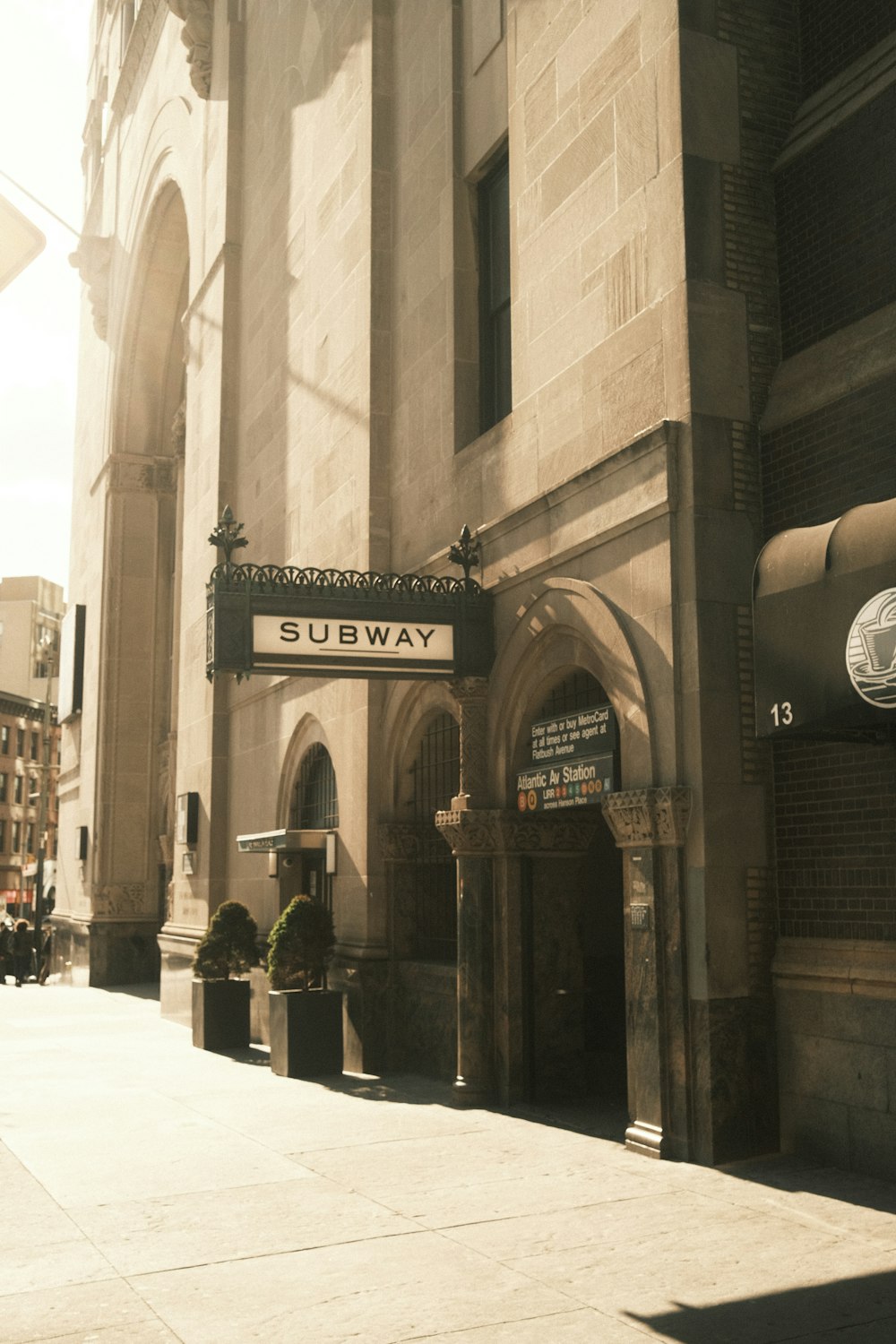 a building with a subway sign on the front of it