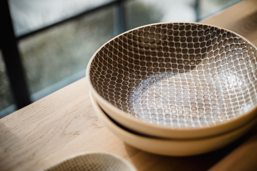 a close up of a bowl on a table