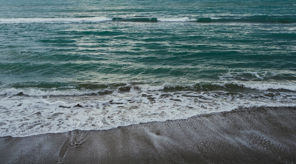 a view of the ocean from a beach