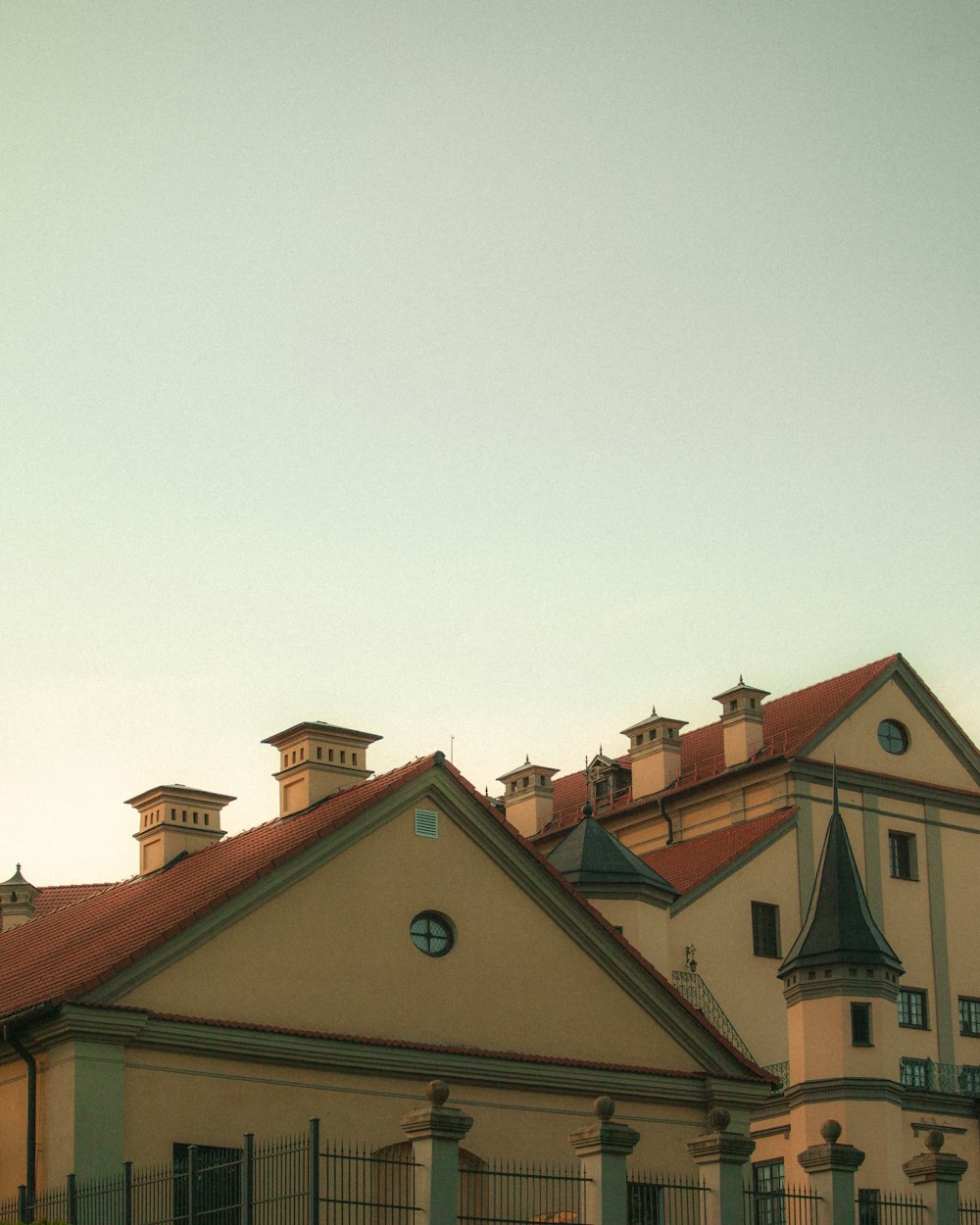 a large building with a clock on the front of it