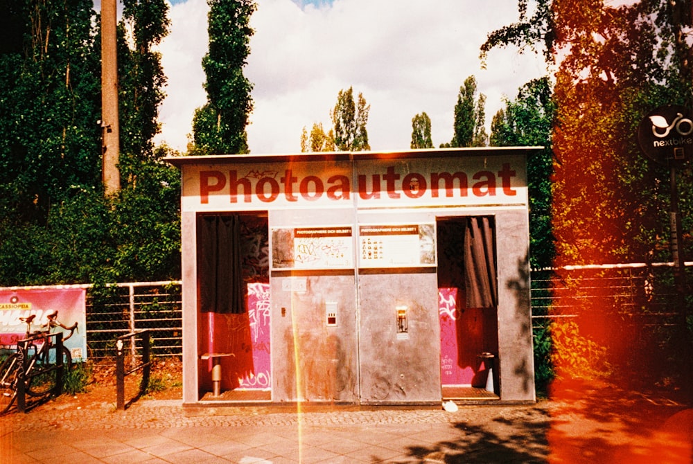 a photo booth with a bicycle parked in front of it