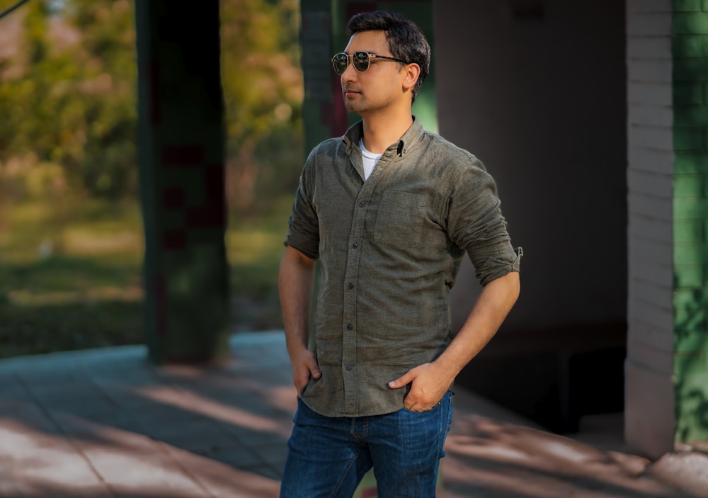 a man standing in front of a building