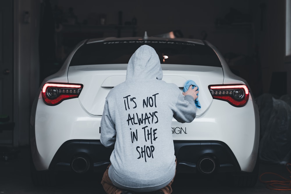 a person wearing a hoodie with the words it's not always in the
