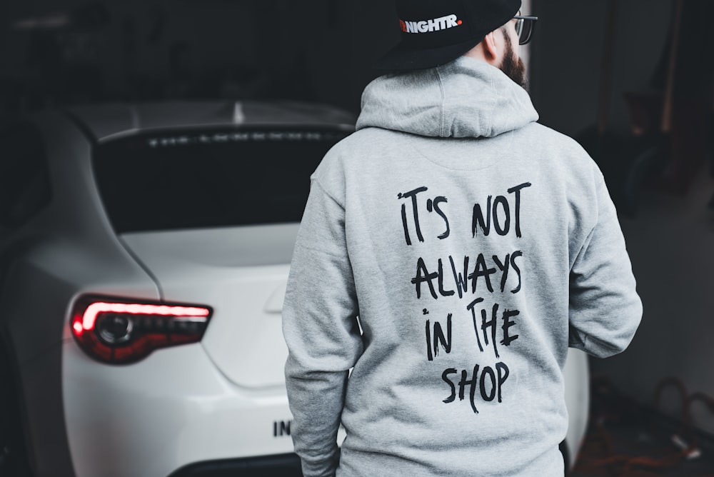 a person wearing a hoodie that says it's not always in the shop