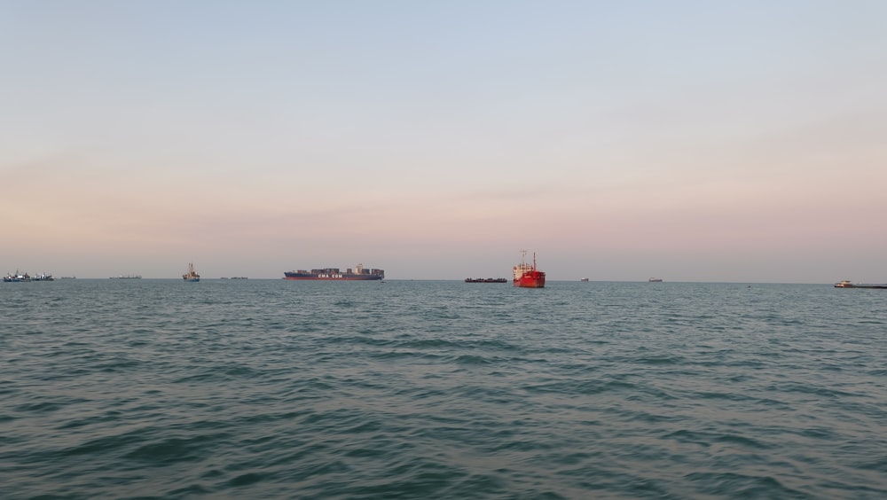 a body of water with boats in the distance