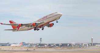 a large jetliner flying through a blue sky