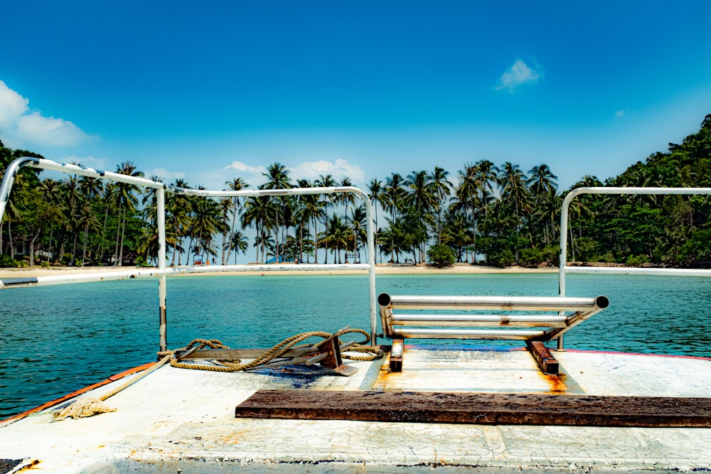 a wooden bench sitting on top of a boat