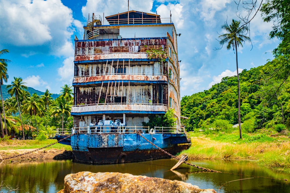 a large boat sitting on top of a river