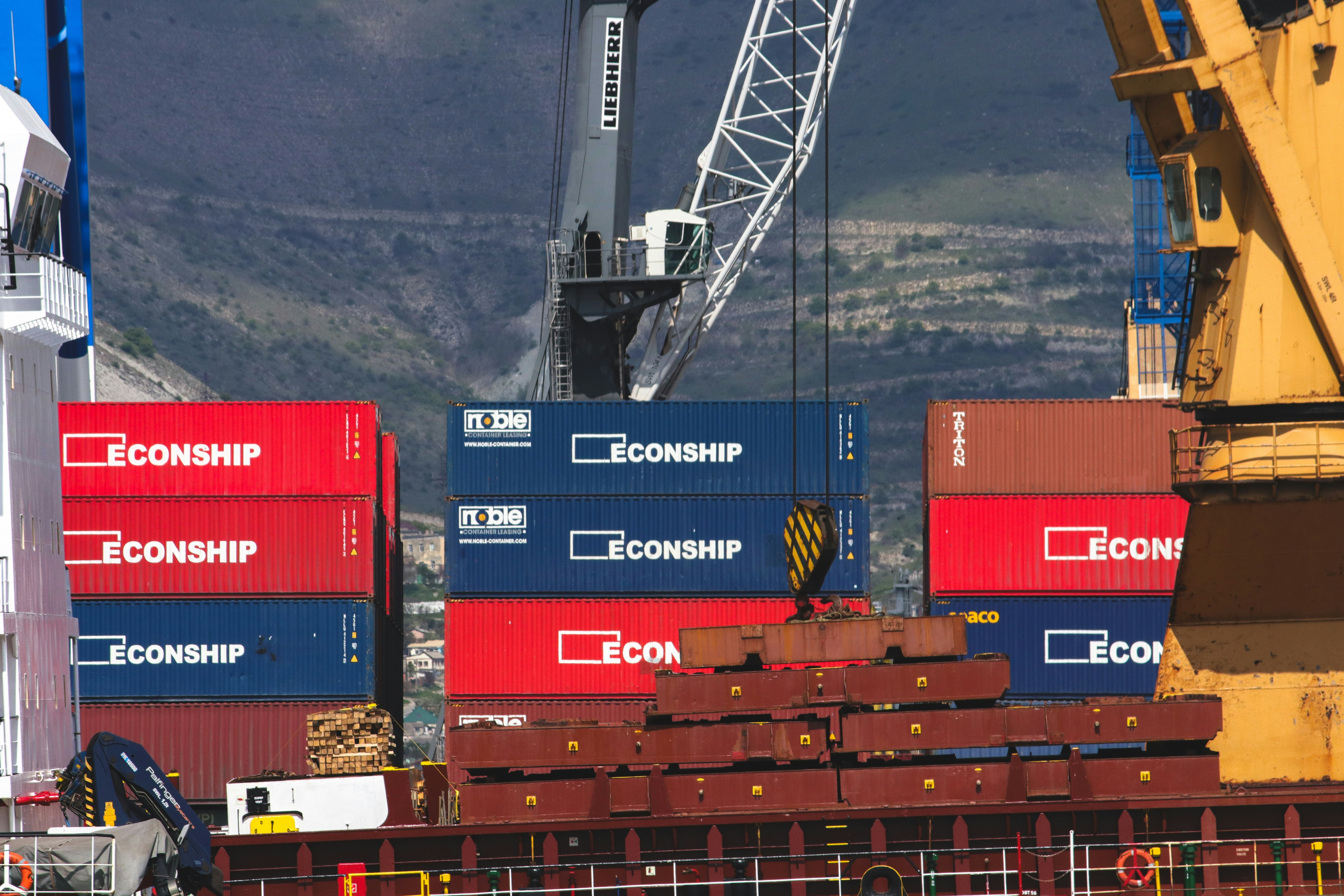 Crane loading cargo ship