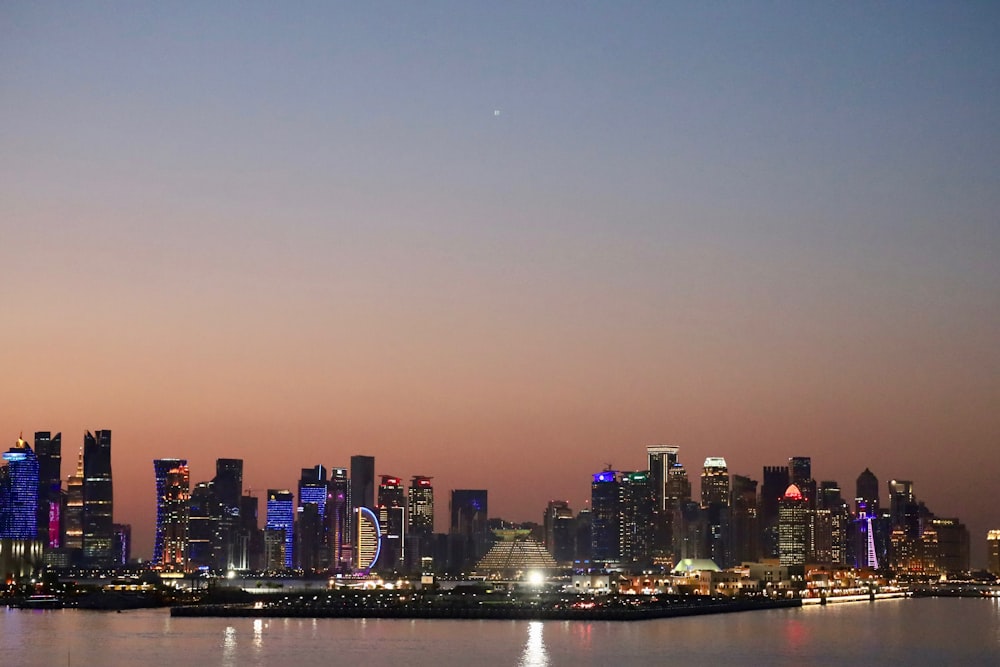 a view of a city at night from across the water