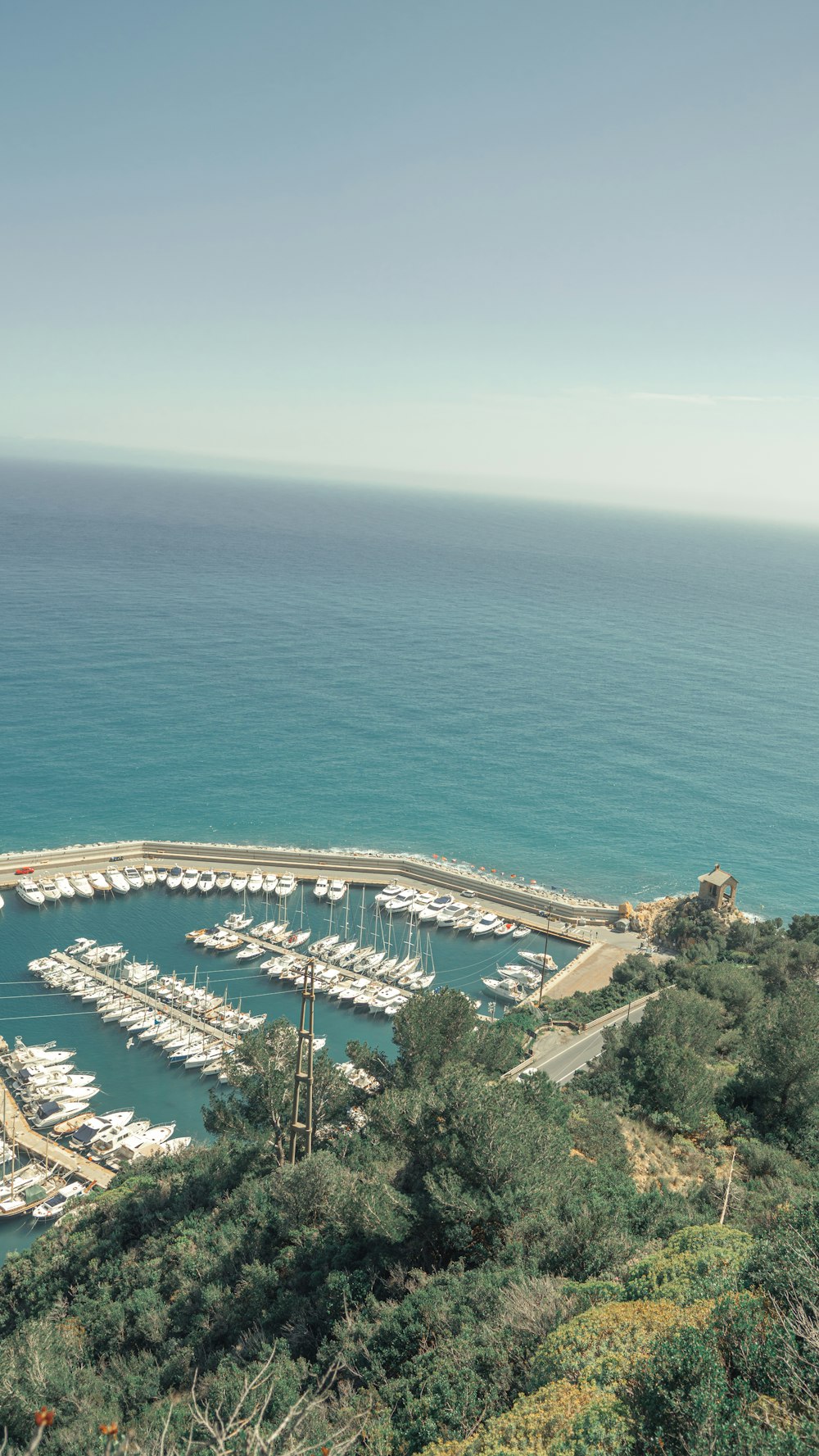 a view of a marina with boats in the water