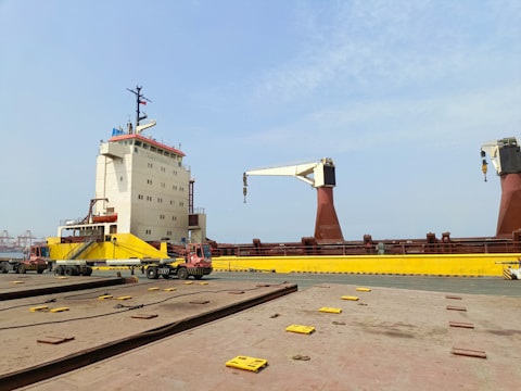 a large crane sitting on top of a train track