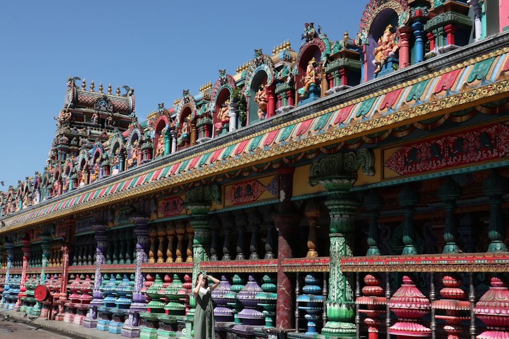 a row of colorfully painted buildings next to each other