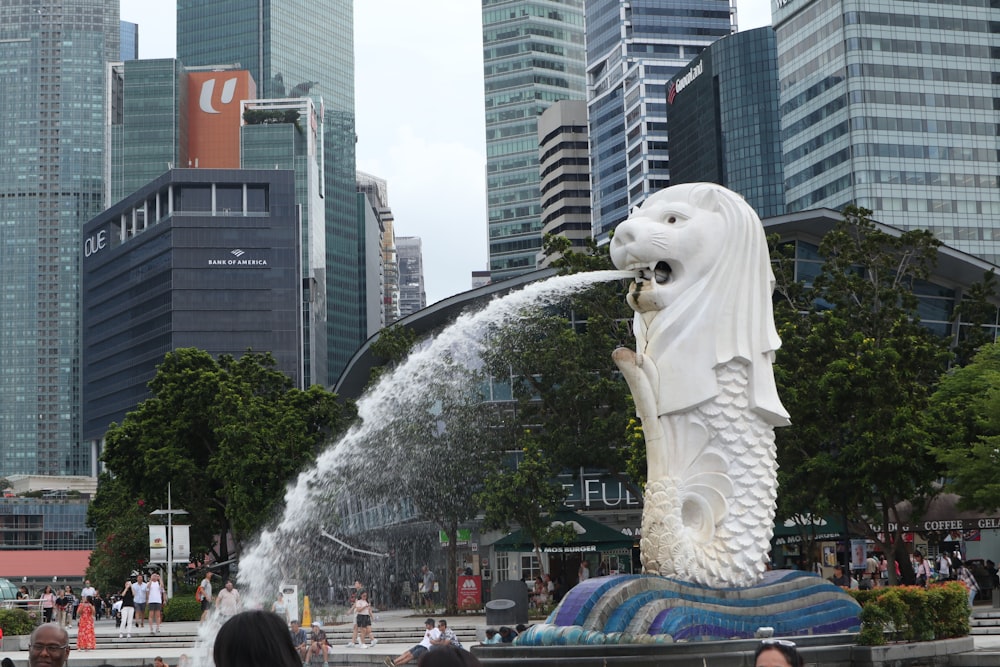 a statue of a lion spewing water from its mouth