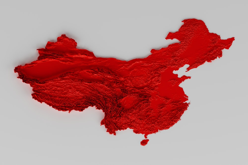 a red map of asia on a white background