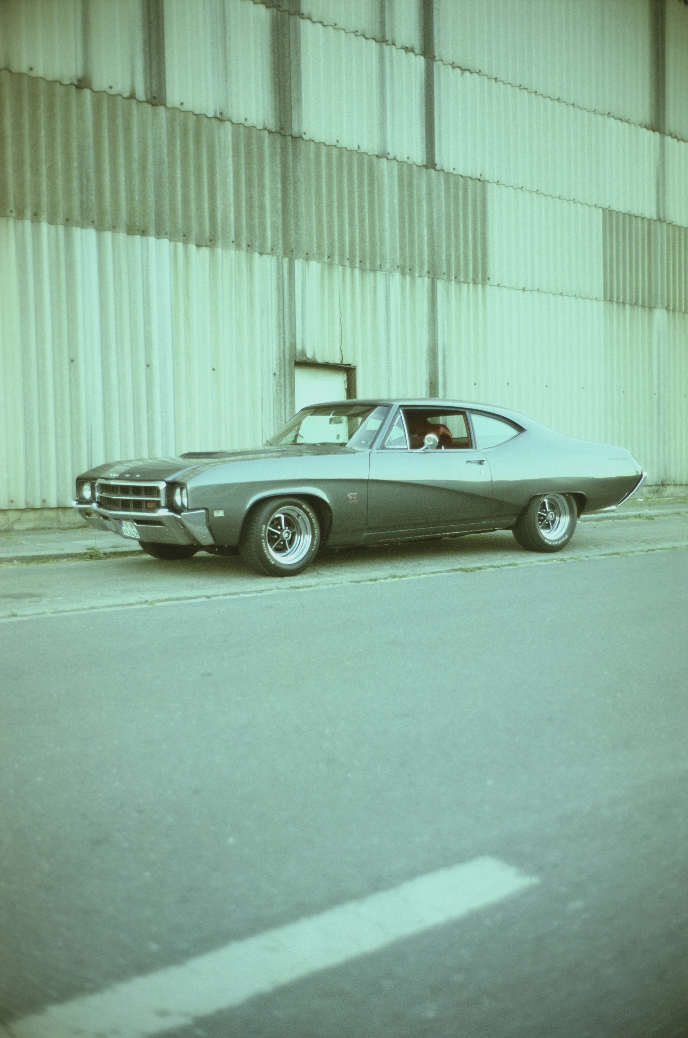 a car parked in front of a building