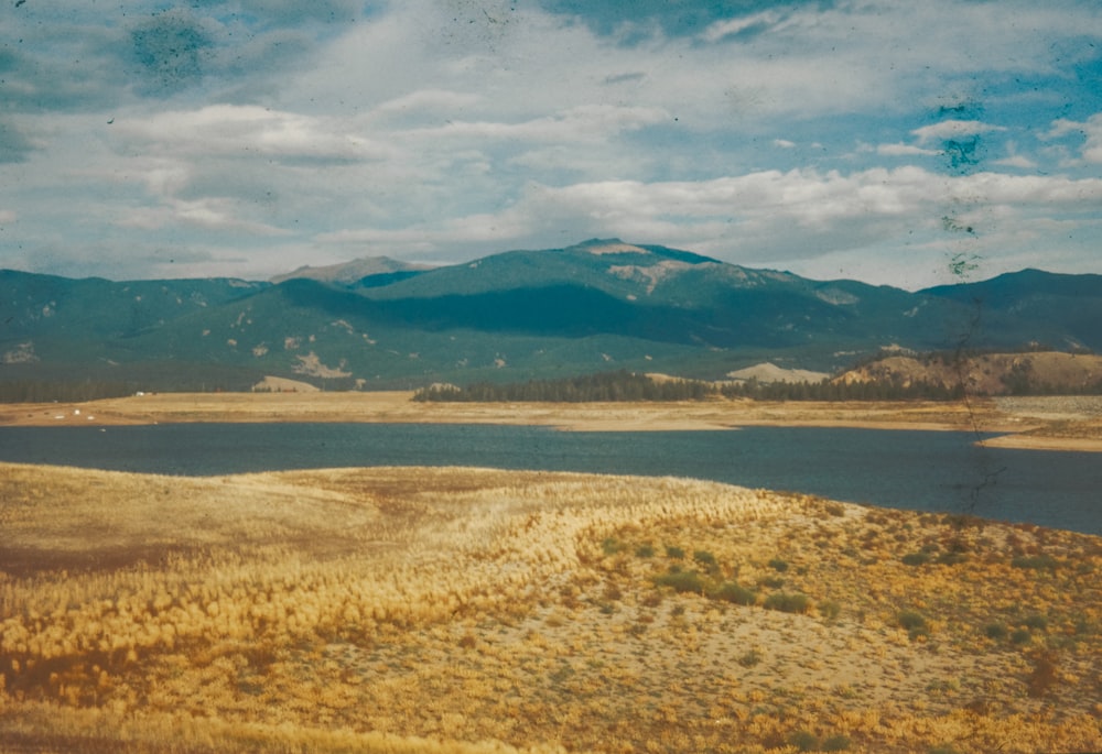 a large body of water surrounded by mountains