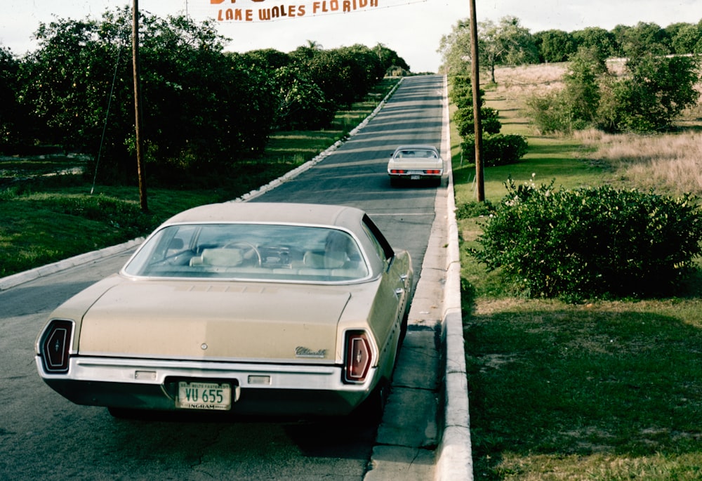 a car is parked on the side of the road