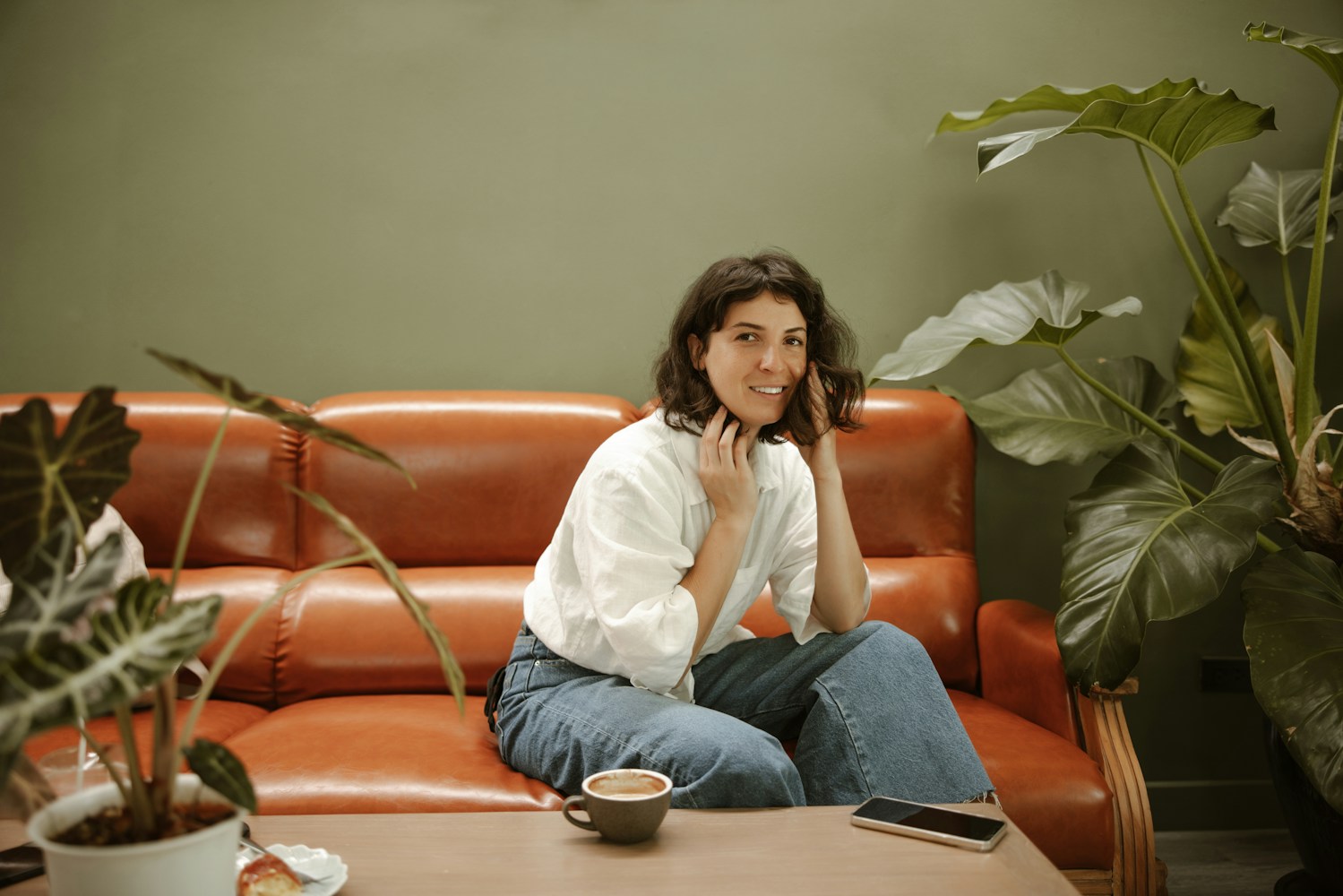 Woman relaxing on couch, peaceful