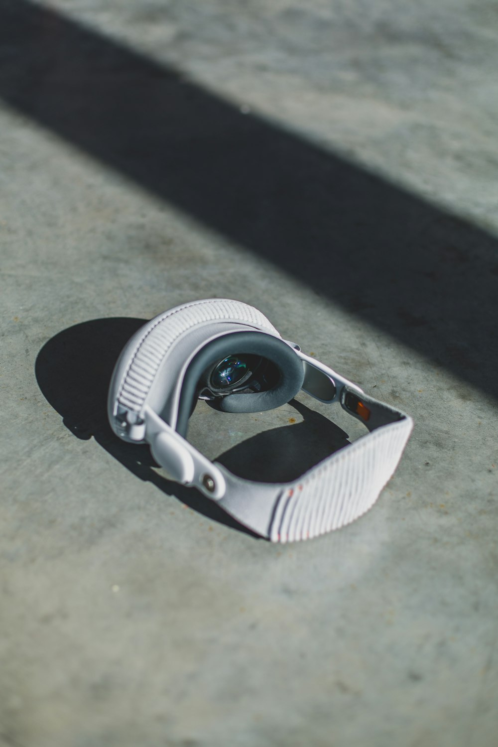 a pair of headphones laying on the ground