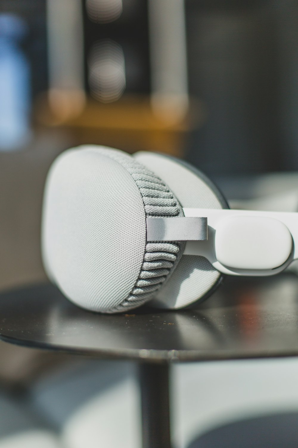 a pair of headphones sitting on top of a table