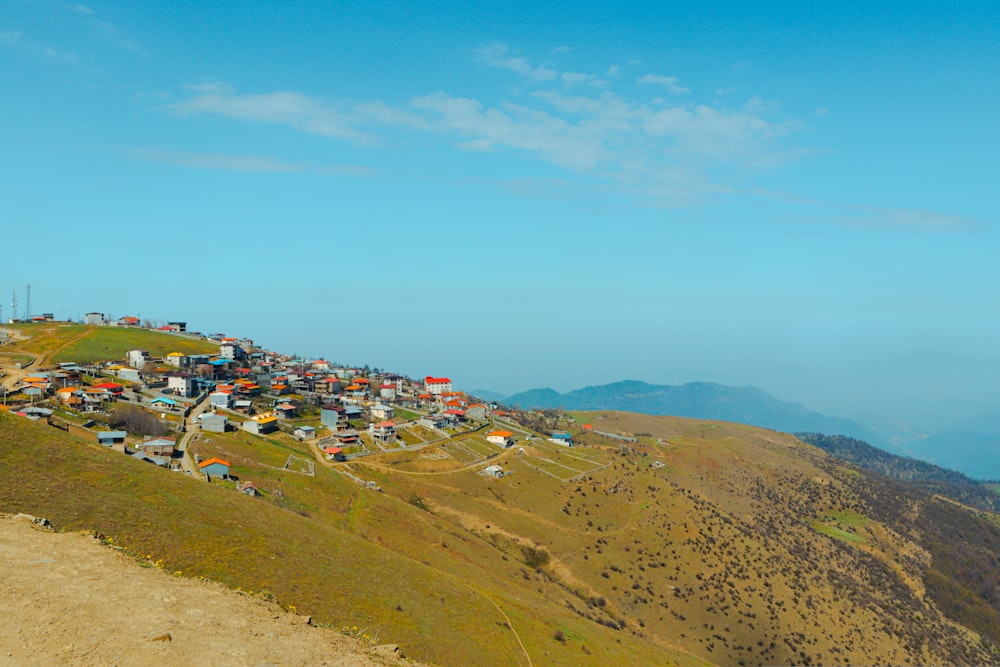 a hill with a village on top of it