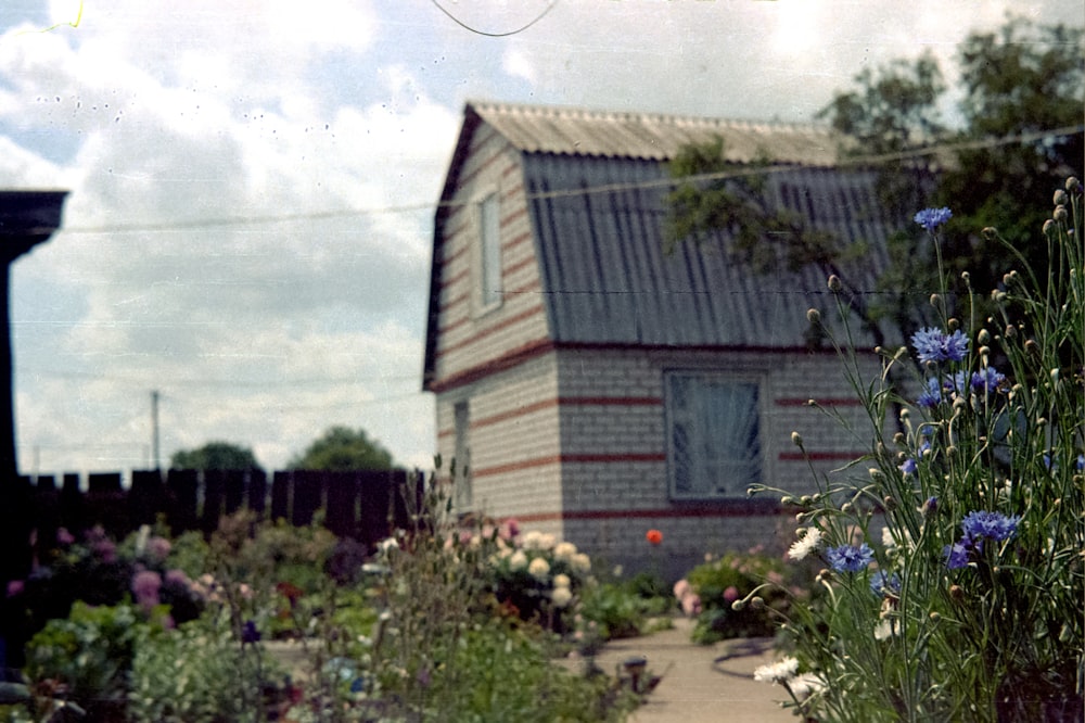 a house with a garden in front of it