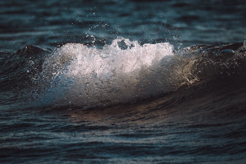 a close up of a wave in the ocean