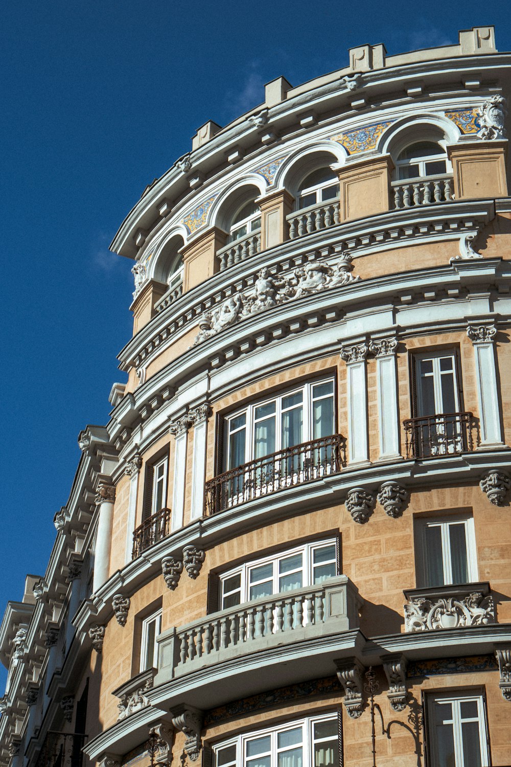 a tall building with a clock on the top of it