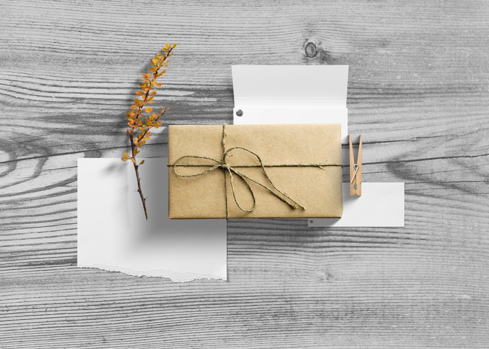 a present wrapped in brown paper and tied with twine
