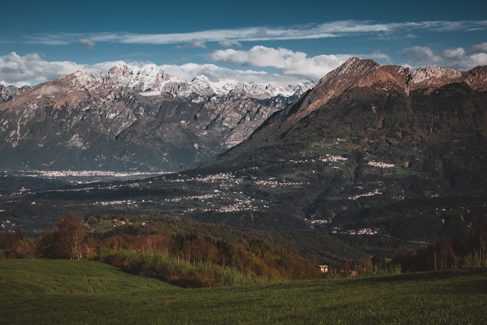 a view of a mountain range with snow on the top