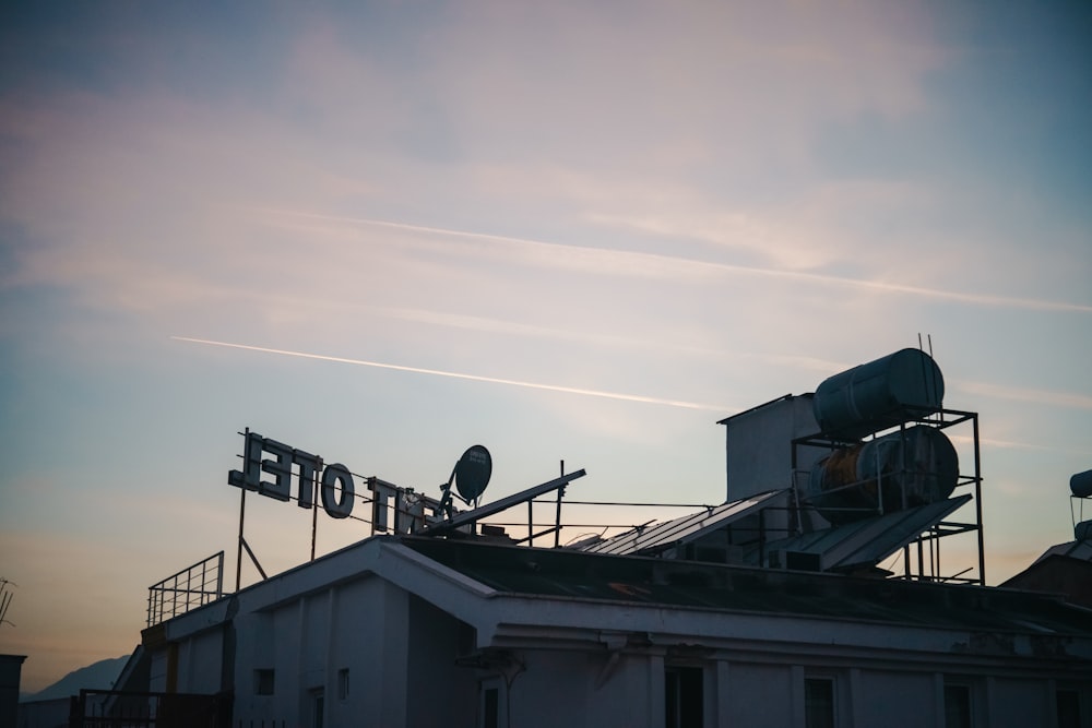 a building that has a sign on top of it