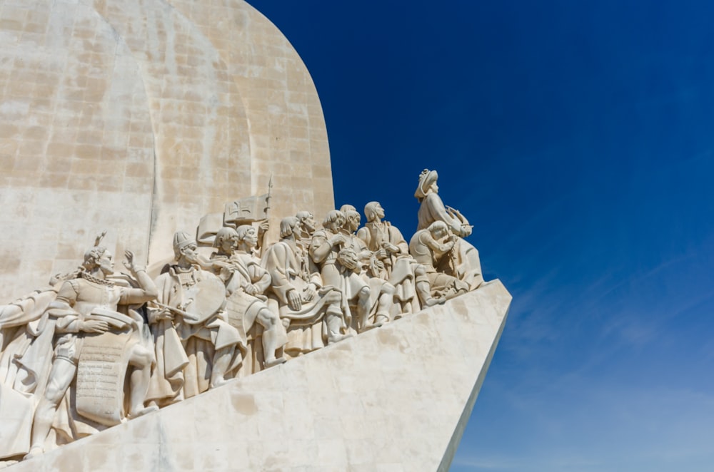 a monument with a bunch of statues on it