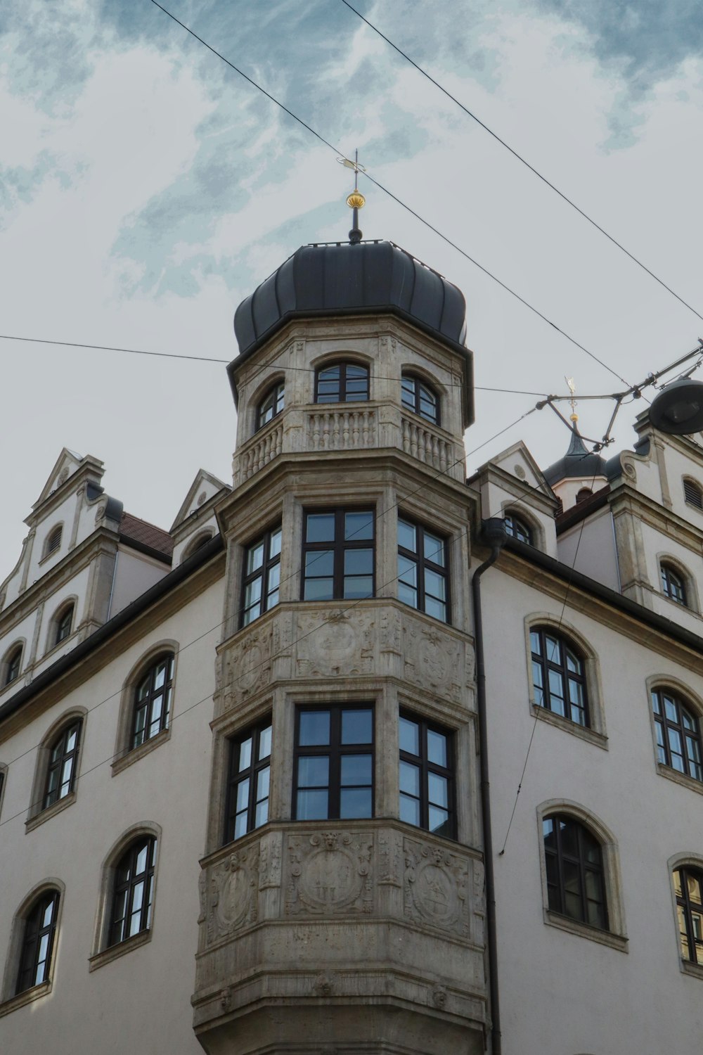 a tall building with a clock on the top of it