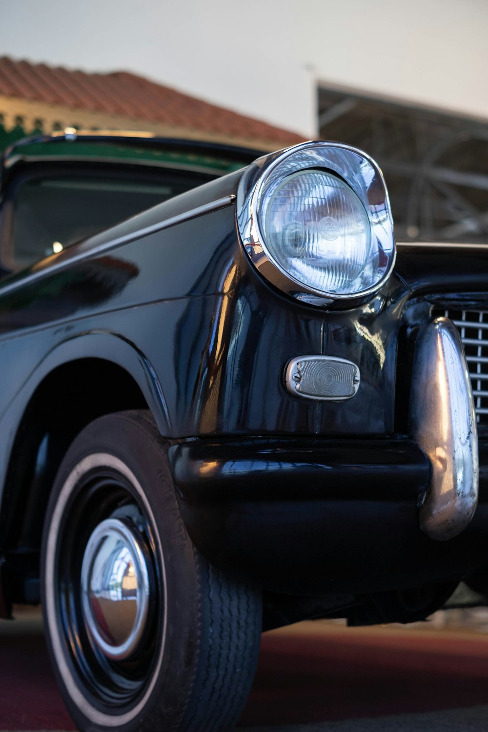 a close up of the front of a black car