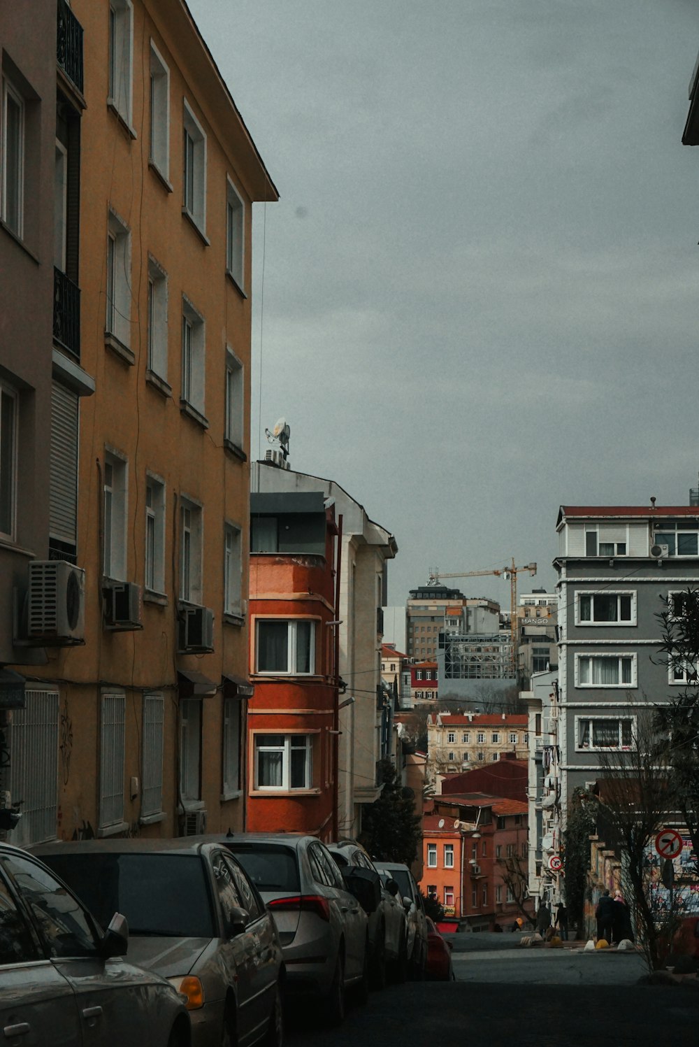 a street with cars parked on both sides of it