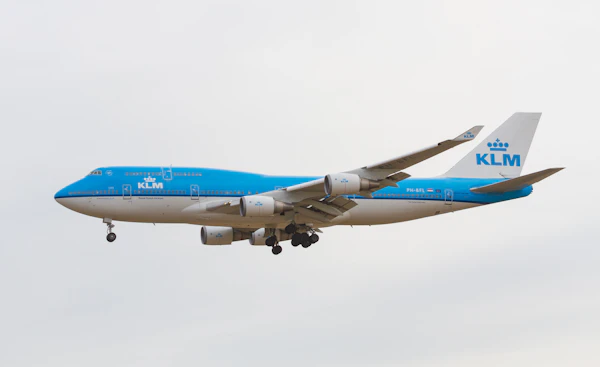 A KLM Boeing 747 in its blue livery in flight &mdash; the Air France and KLM award trips worth locking in before the September 8 Flying Blue change