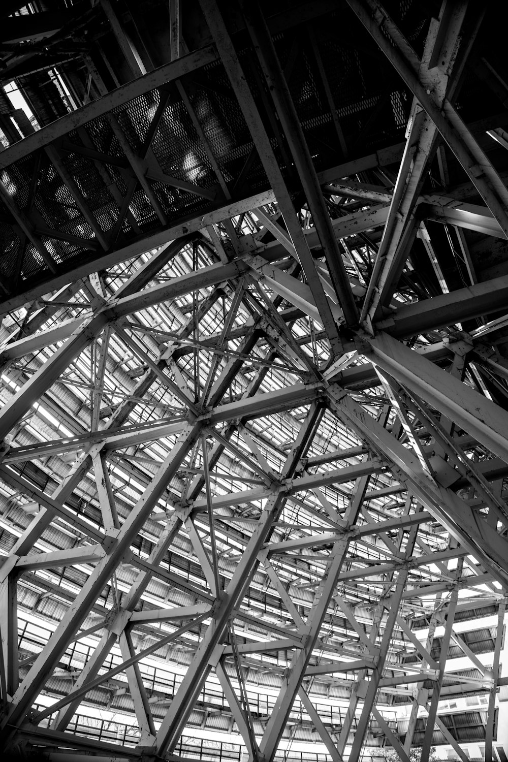 a black and white photo of a metal structure