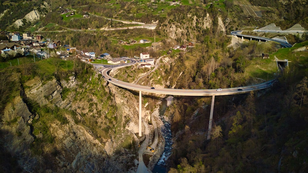 an aerial view of a bridge over a river