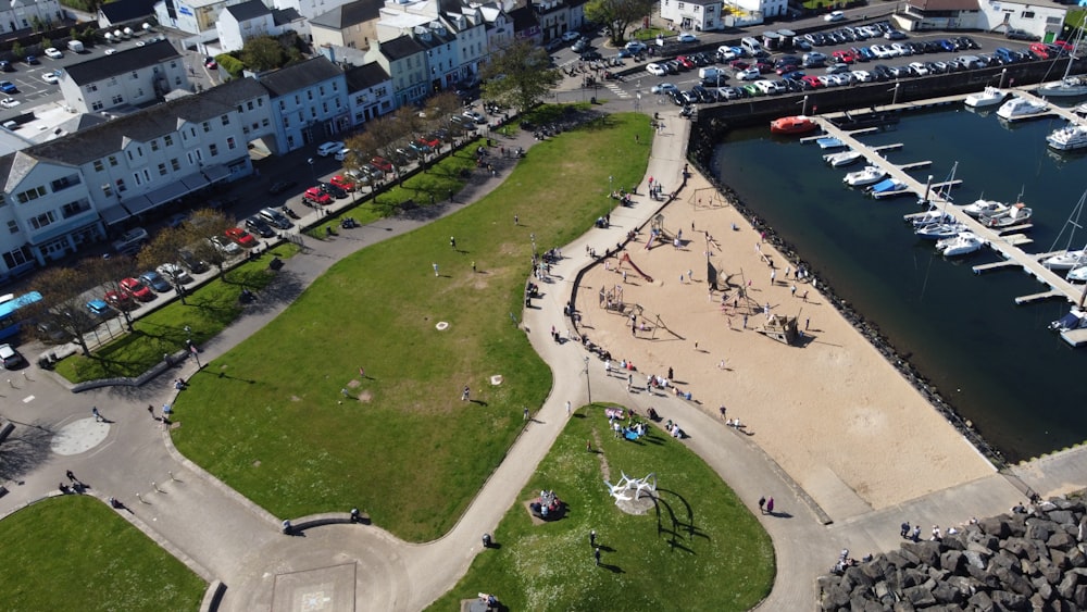 an aerial view of a marina with boats docked