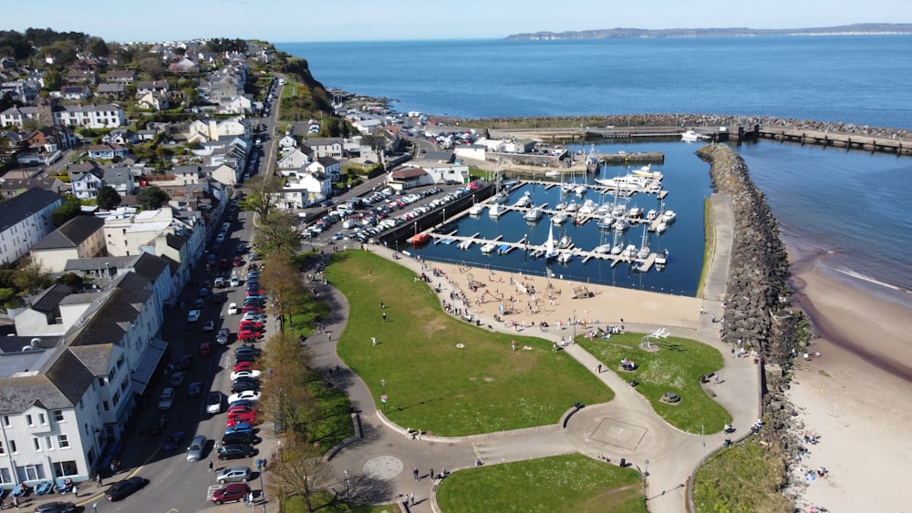 an aerial view of a marina with boats in the water