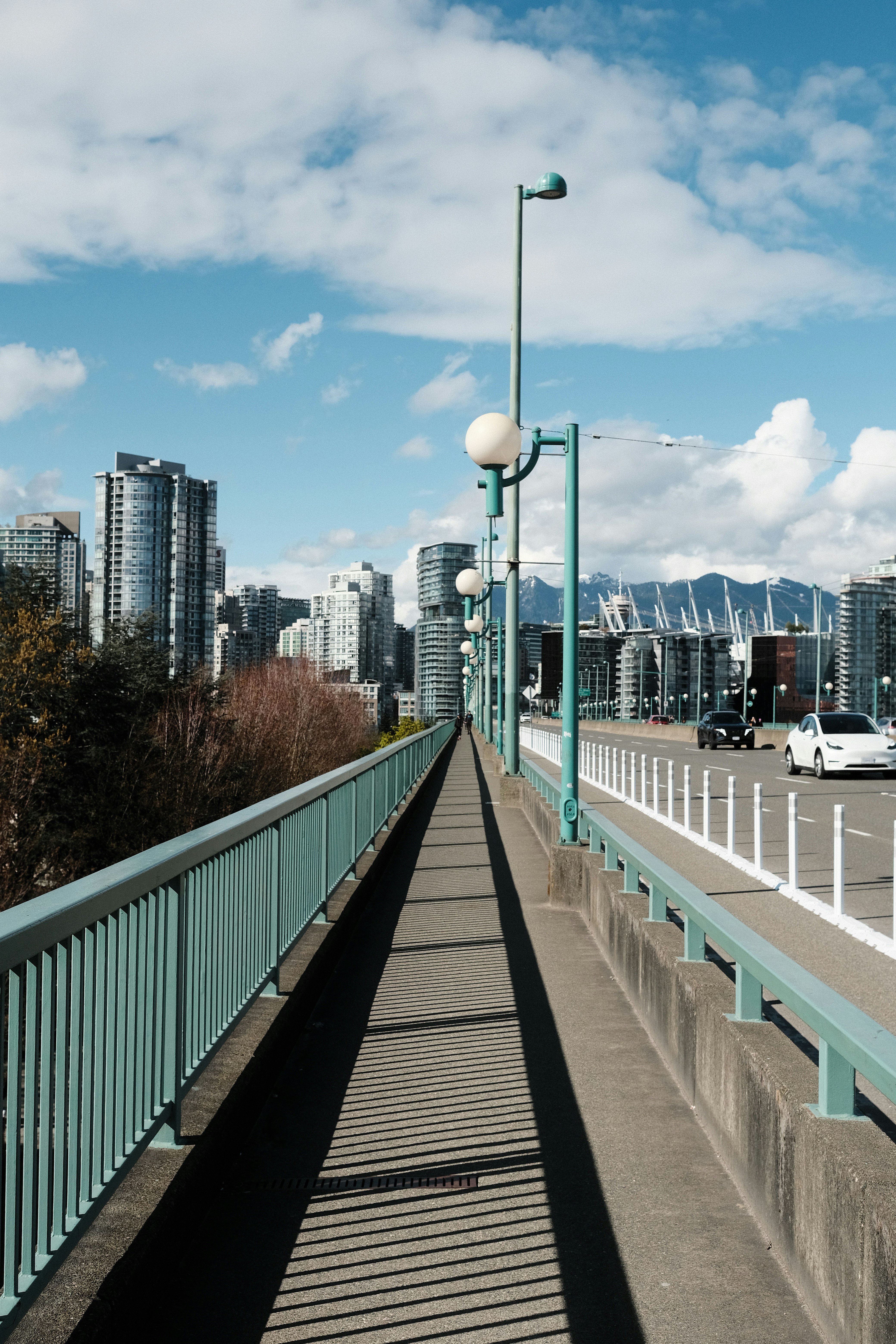 a long bridge with a street light on top of it