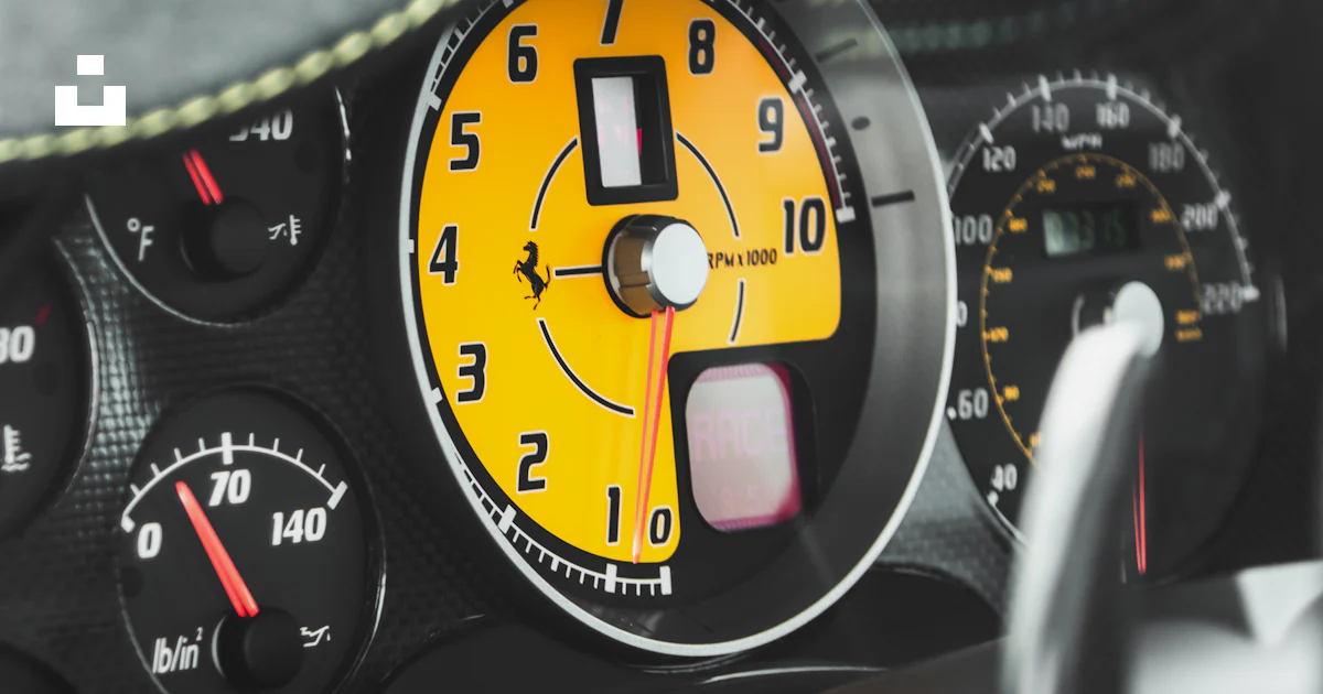 A close up of a car dashboard with a speedometer photo – Free Usa Image ...