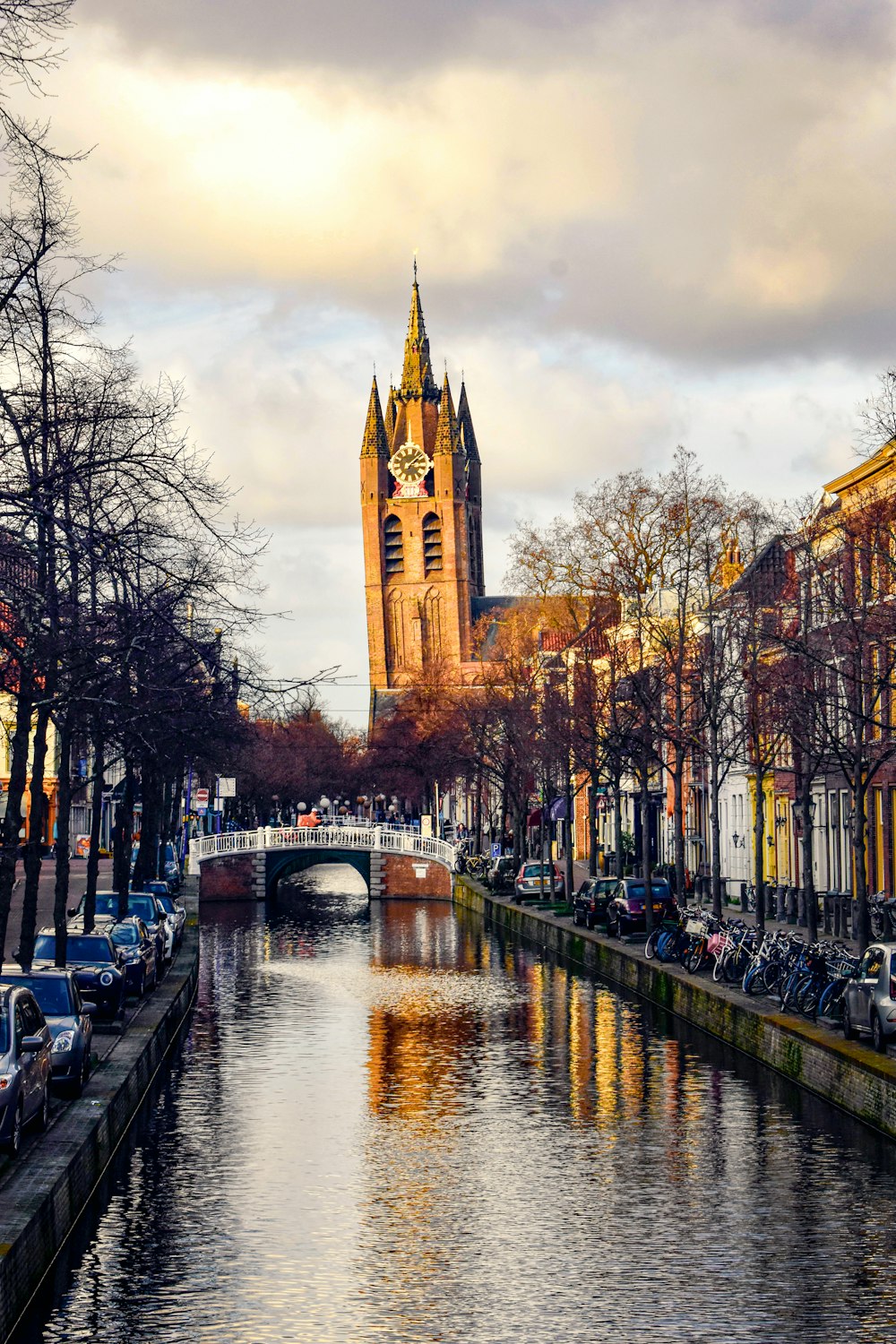 a river running through a city next to tall buildings