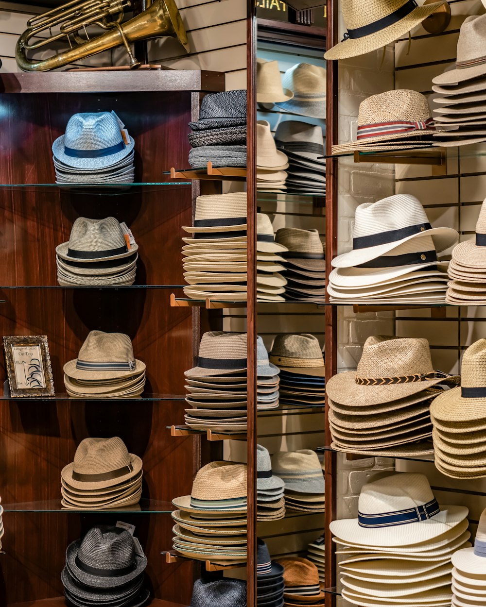 a display case filled with lots of hats