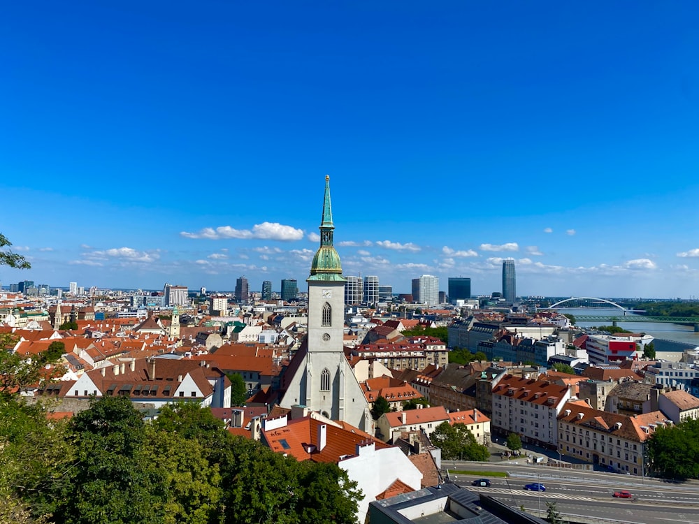 a view of a city with a church steeple