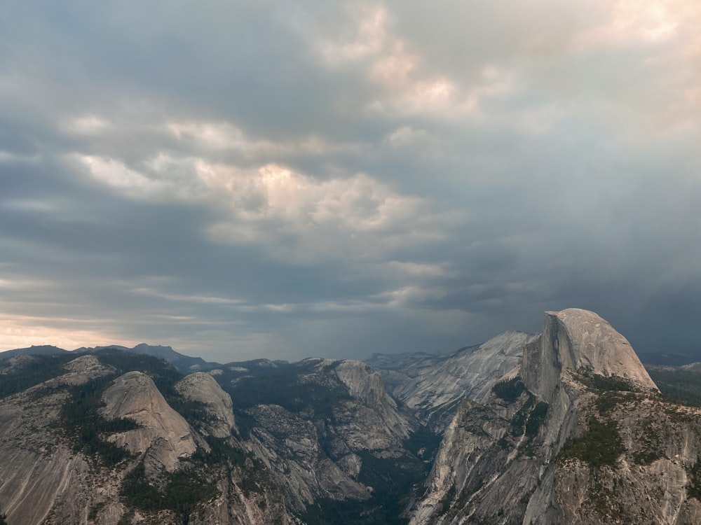 a view of the mountains from the top of a mountain